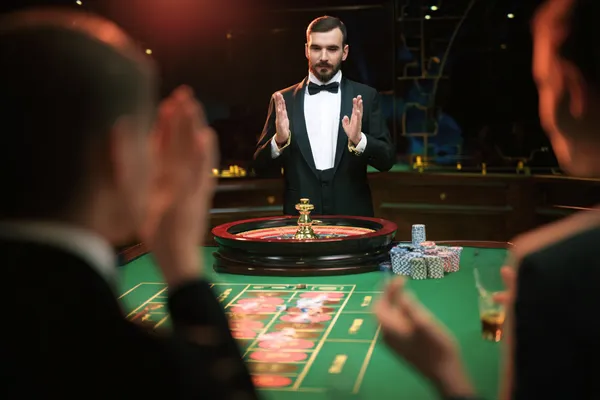 A glamorous woman holding casino chips in a neon-lit environment, representing the premium online casino atmosphere of LINEBED.